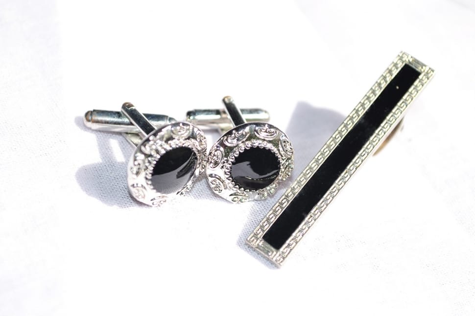 pair silver and black beaded earrings preview