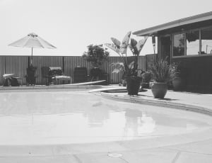 grayscale photo of indoor pool thumbnail
