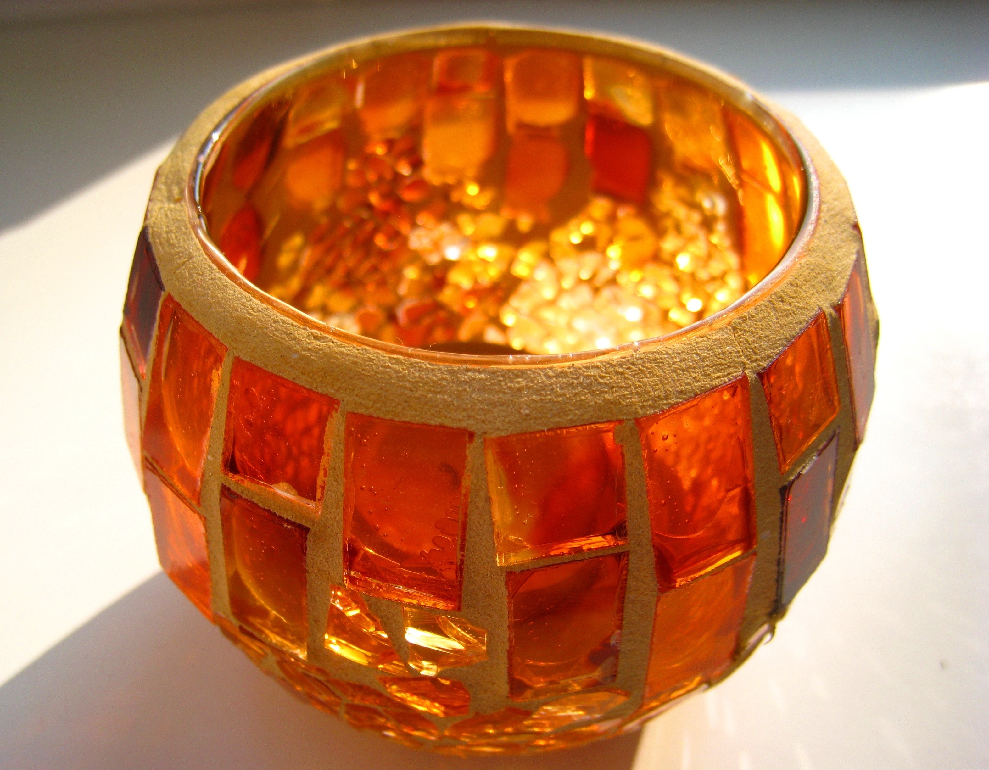 round brown and orange translucent glass bowl