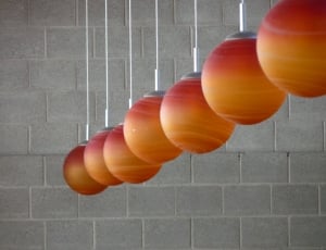 orange and silver round pendant lamps thumbnail