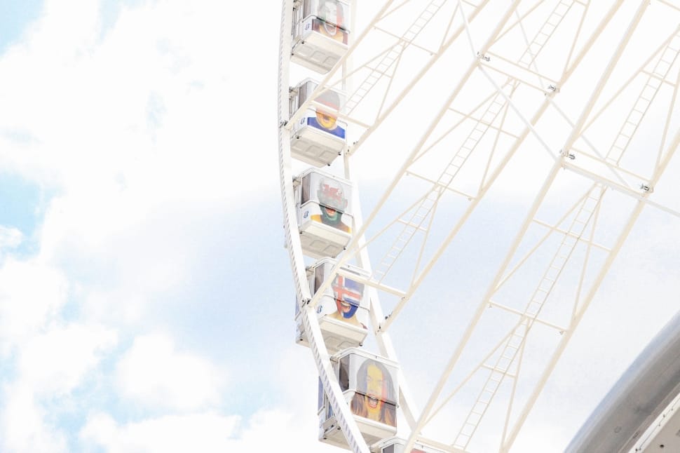 white ferris wheel with nimbus cloud background preview