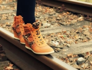 orange brown and black leopard print high tip sneakers thumbnail