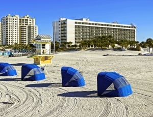 blue inflatable dancing balloon on beach thumbnail