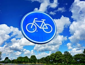 blue and white bicycle signage thumbnail