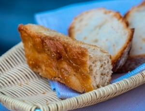 flavored bread on beige wicker plate thumbnail