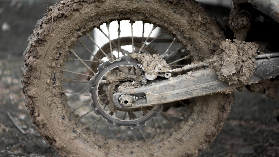 black  motorcycle wheel with mud preview