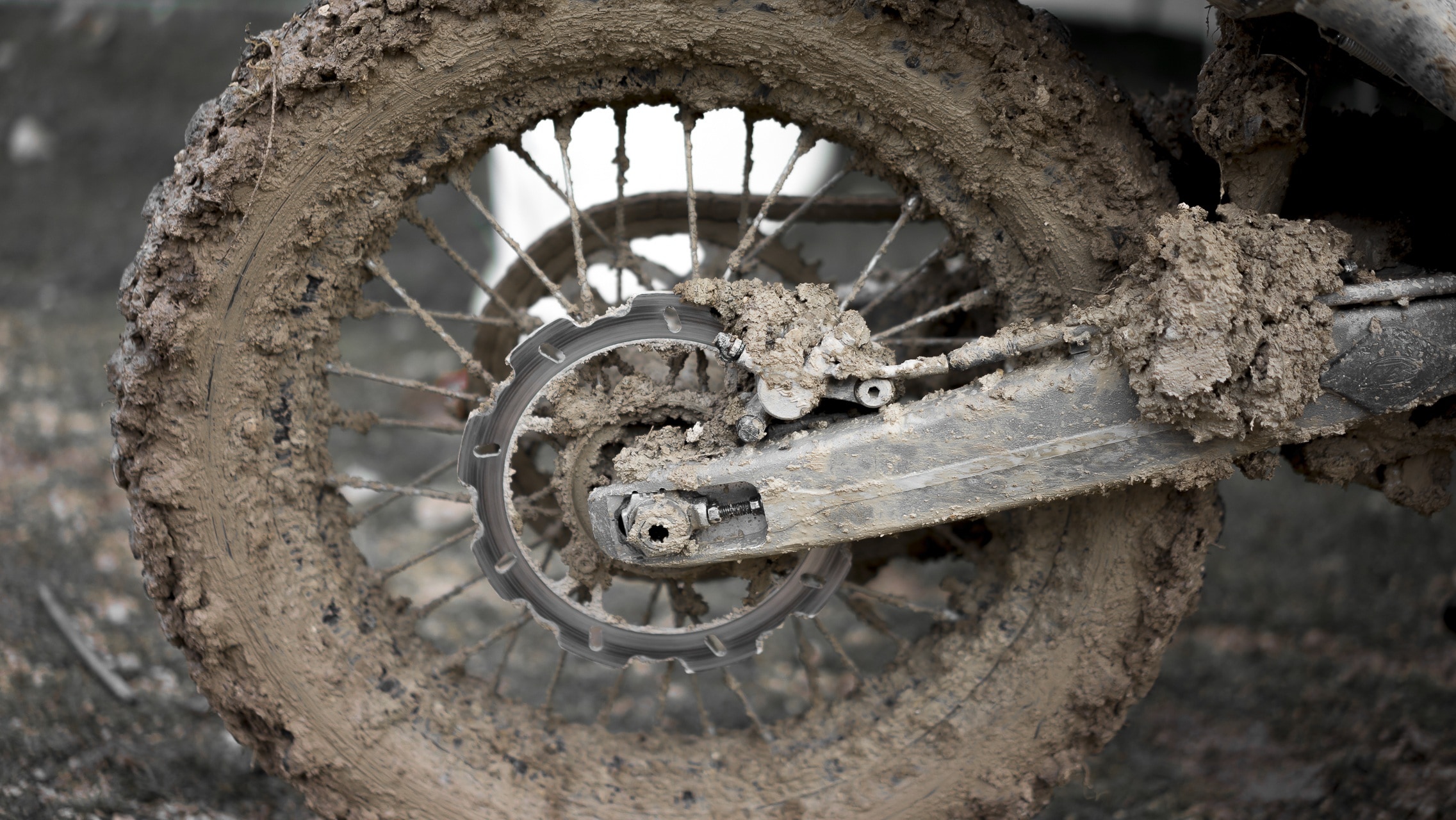 black  motorcycle wheel with mud