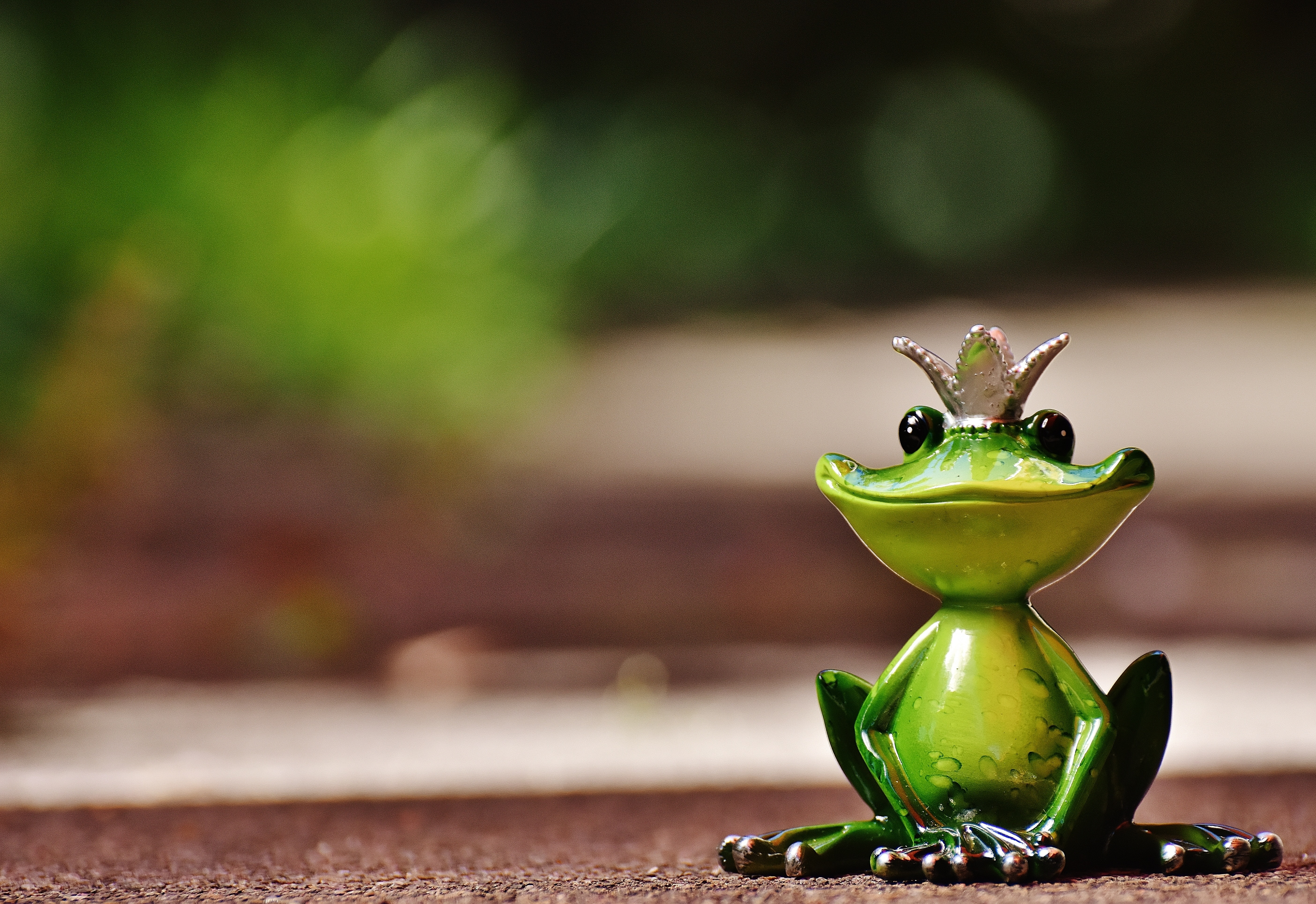 green ceramic frog decor