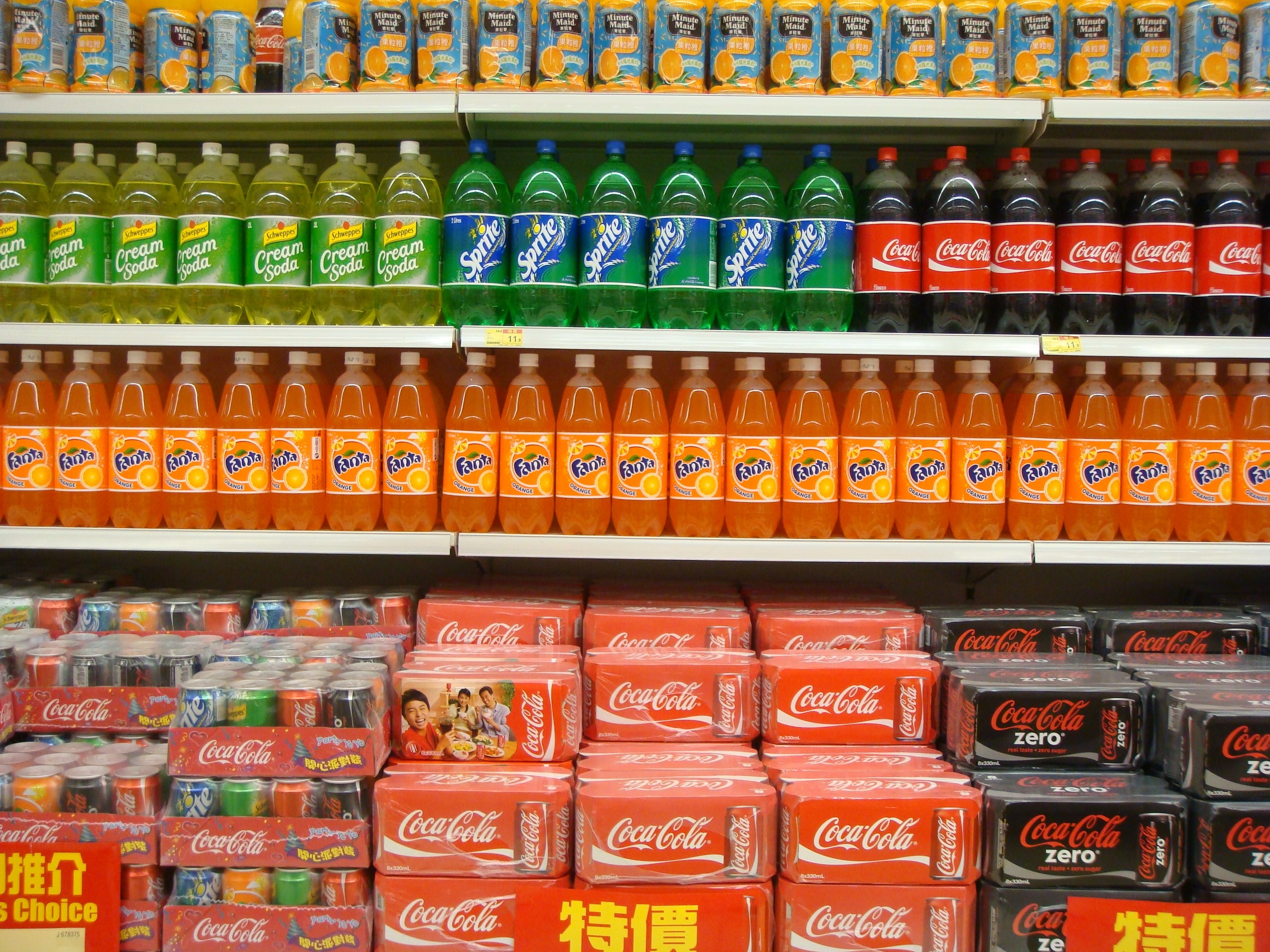soda products arranged on retail gondola