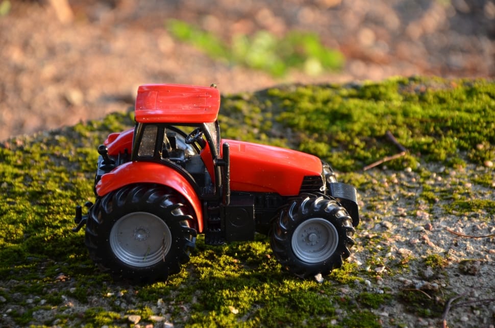orange and black tractor toy preview