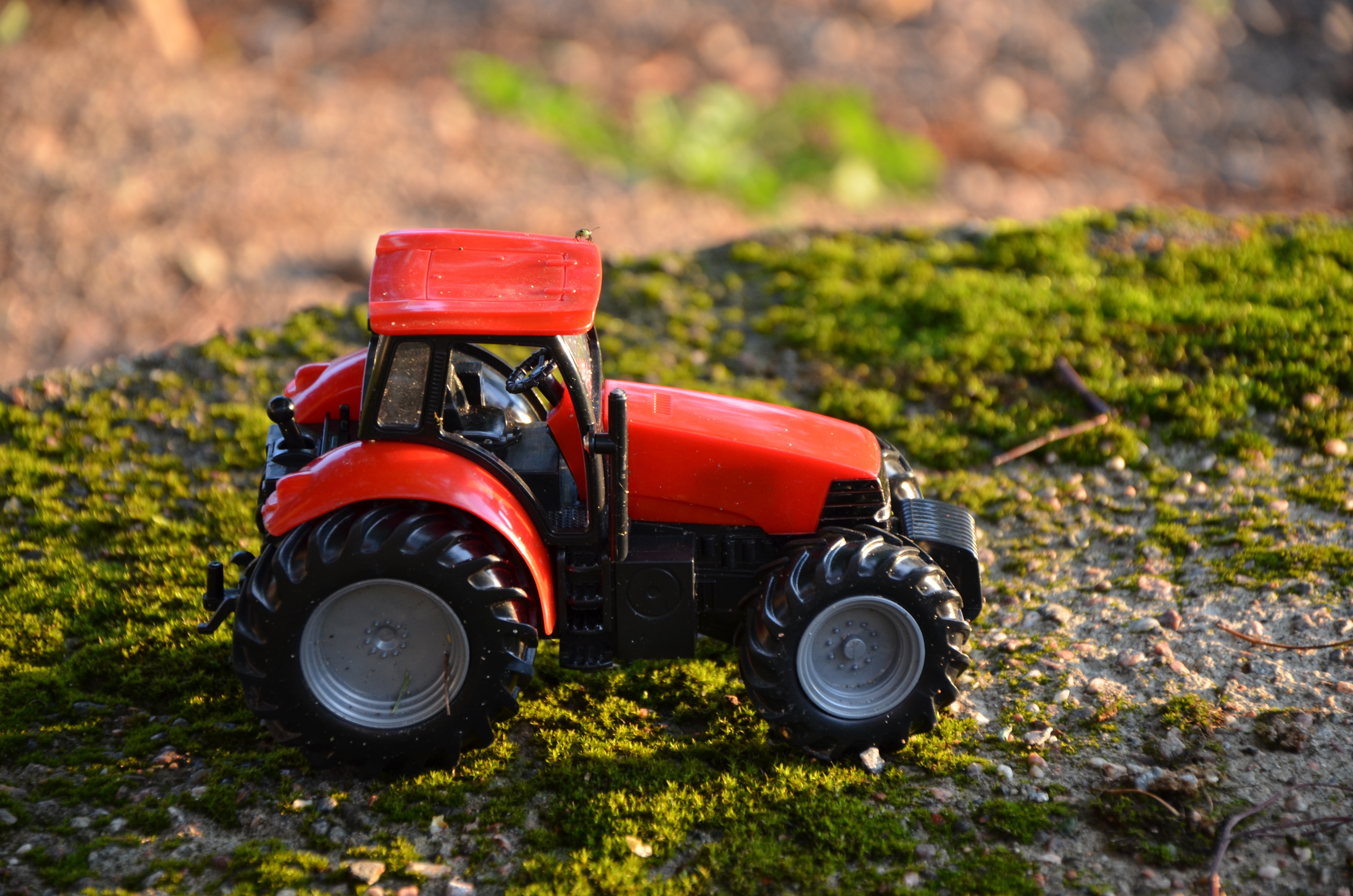 orange and black tractor toy