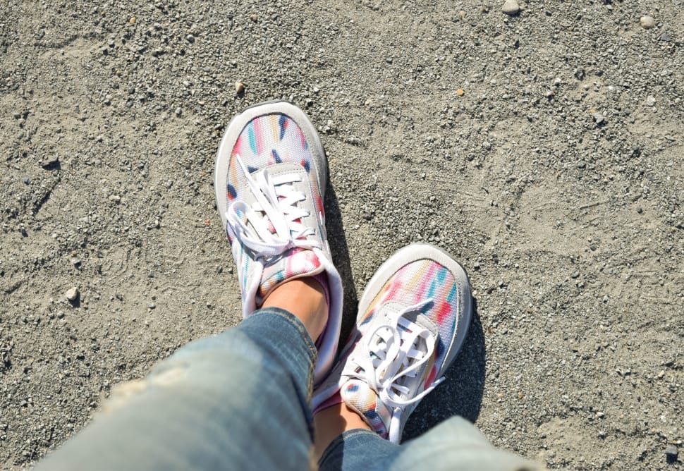 pair of multicolored low cut sneakers preview