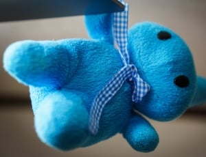 blue plush toy wearing necktie thumbnail