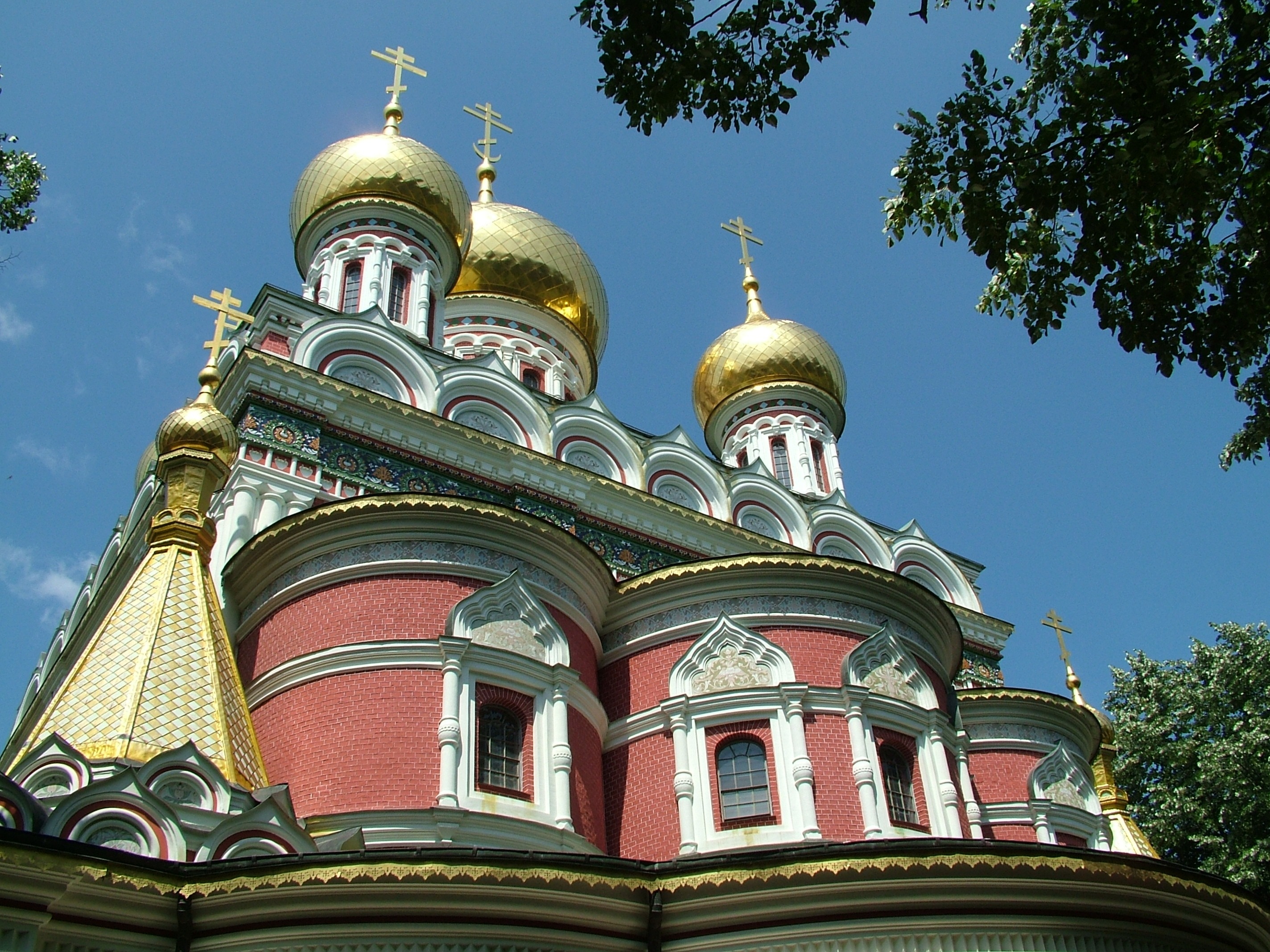photo of red and brass religious building