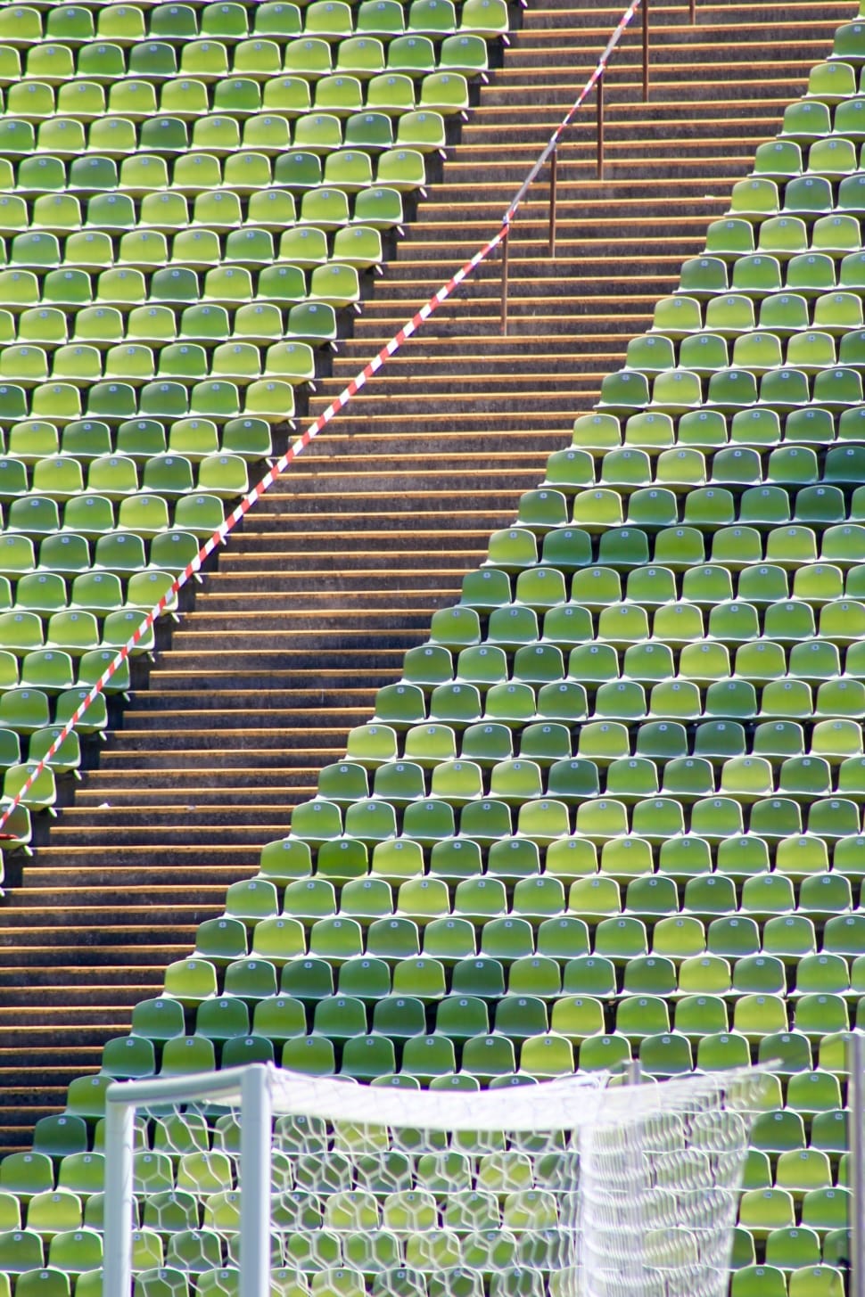 green bench set on stadium preview