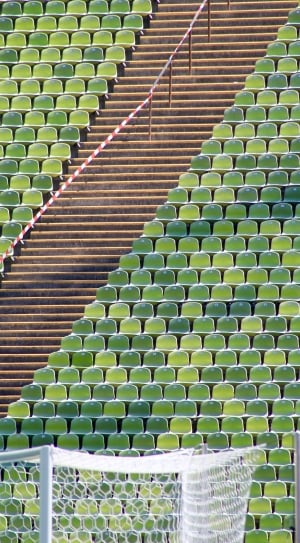green bench set on stadium thumbnail