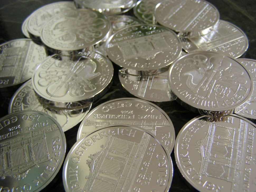 close up photography of round silver coins preview