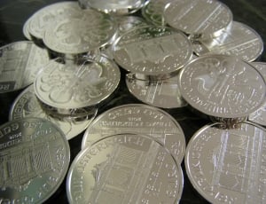close up photography of round silver coins thumbnail