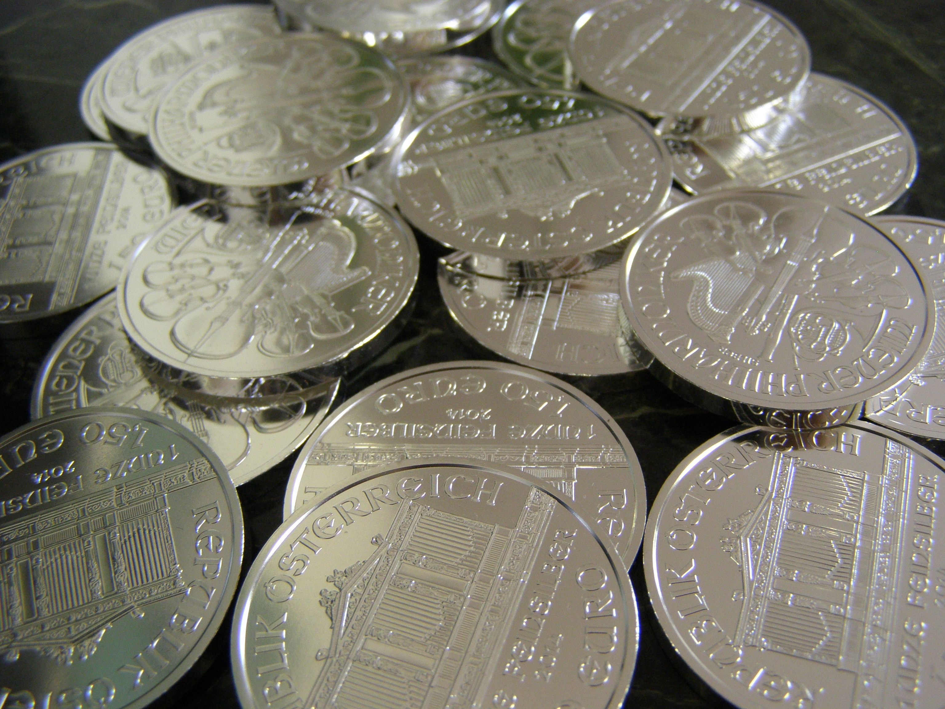 close up photography of round silver coins