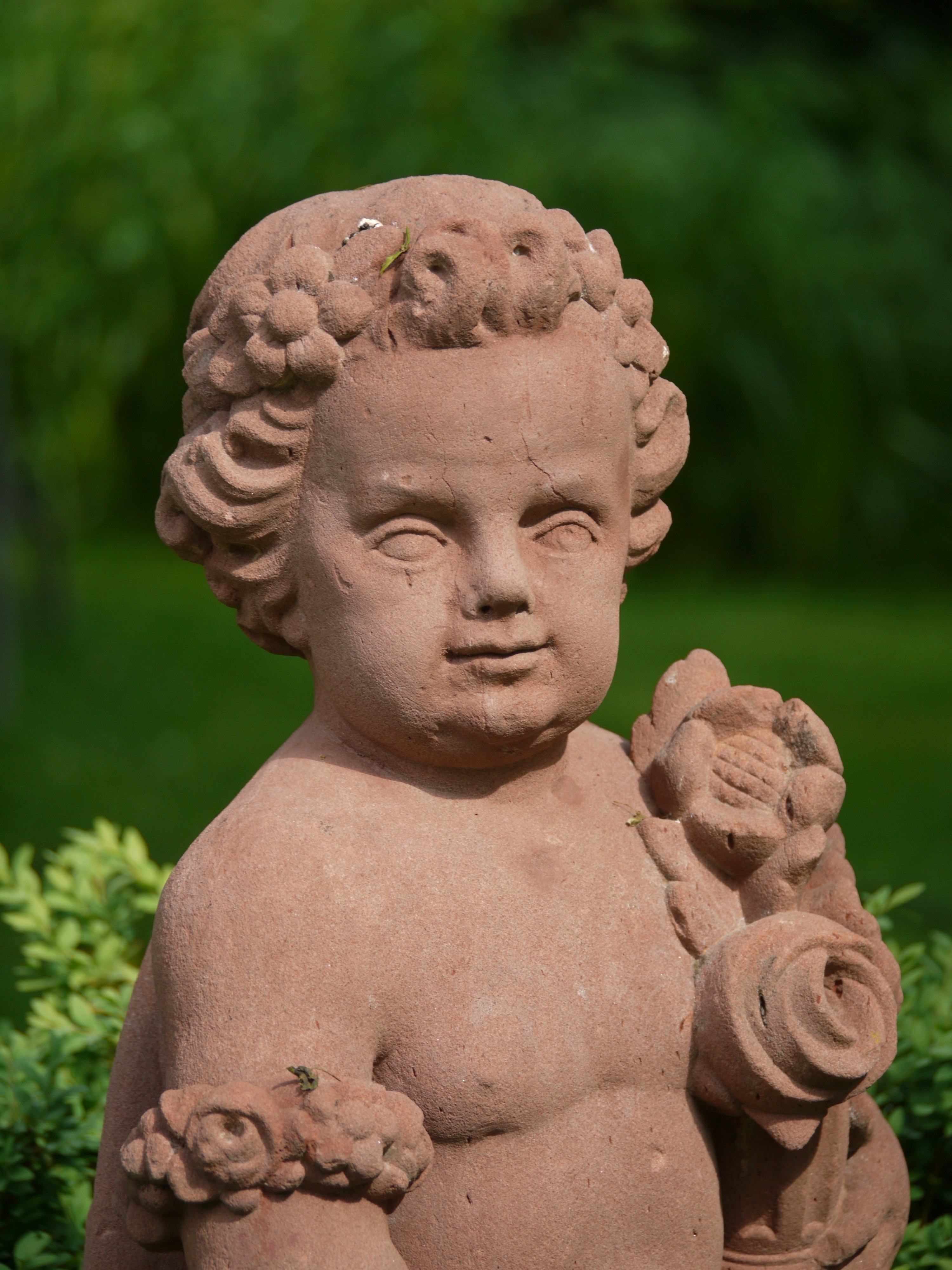 brown child patio figurine