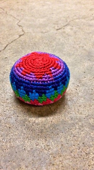 red purple and blue knitted ornament thumbnail