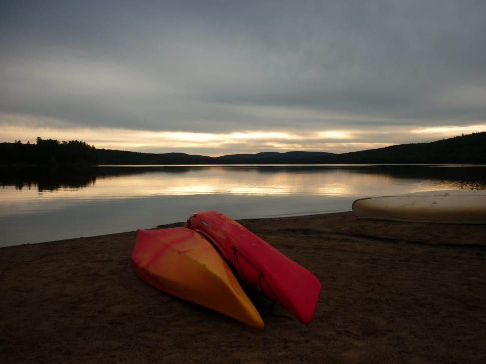 2 yellow and red kayaks preview