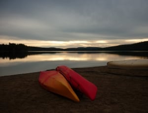 2 yellow and red kayaks thumbnail