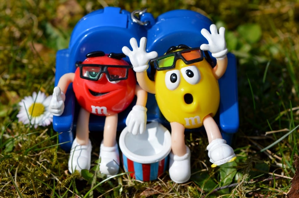 two yellow and red M and M's figurines preview