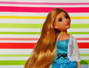 white and blue dressed doll thumbnail
