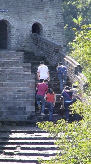 six people climbing up stairs of Great Wall of China at daytime thumbnail