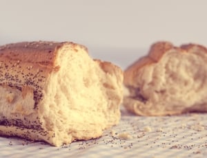 baked bread on white textile thumbnail