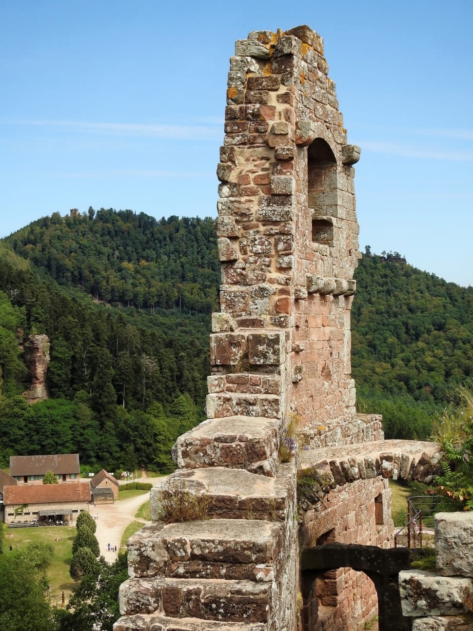 church ruins near mountain during daytime preview
