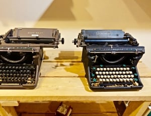 2 black and grey typewriters thumbnail