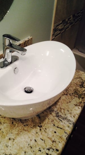 white ceramic sink with faucet thumbnail