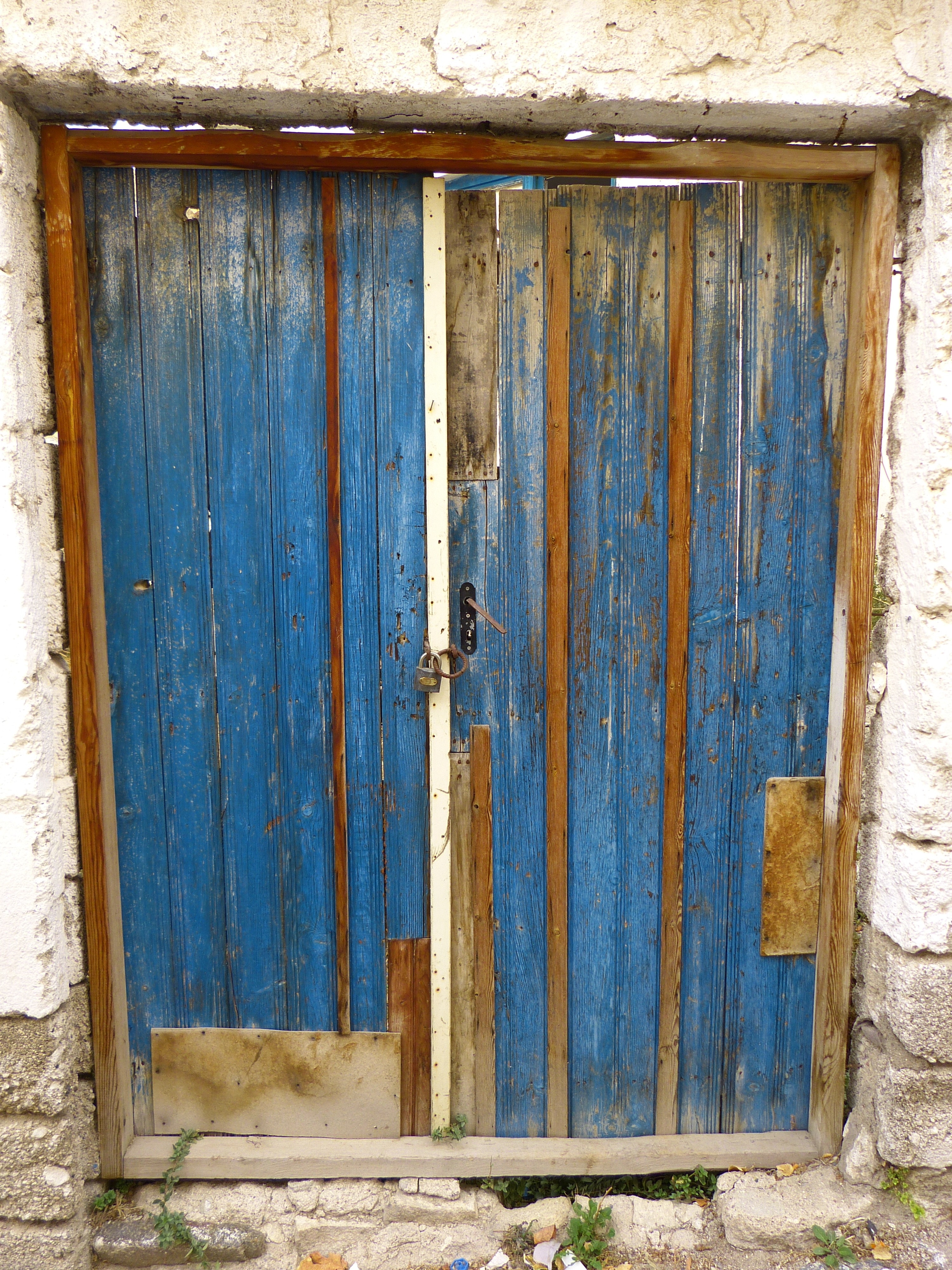 blue wooden side by side door