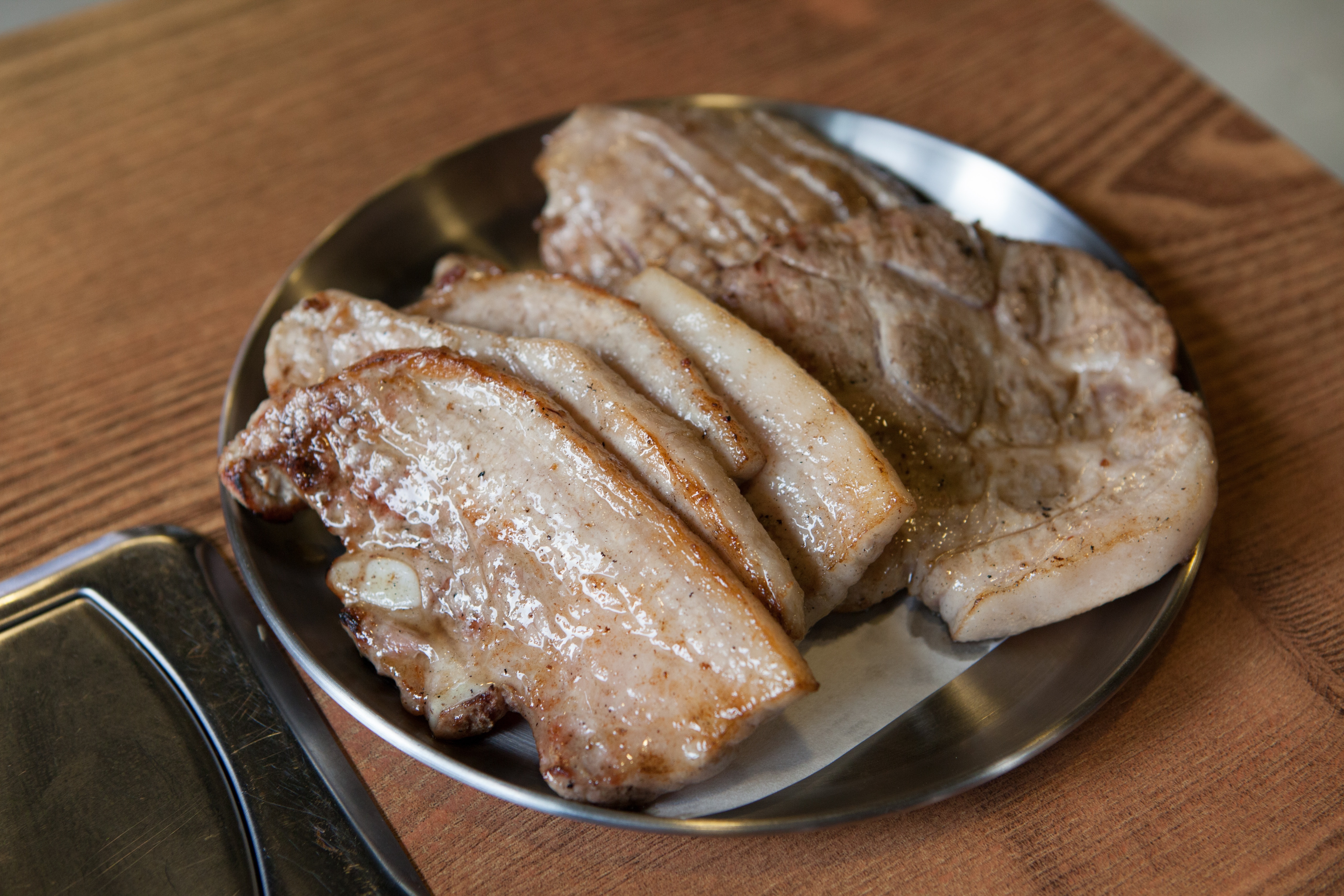 pork in stainless steel round plate