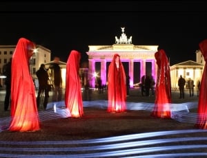 five red dresses lighted statues thumbnail