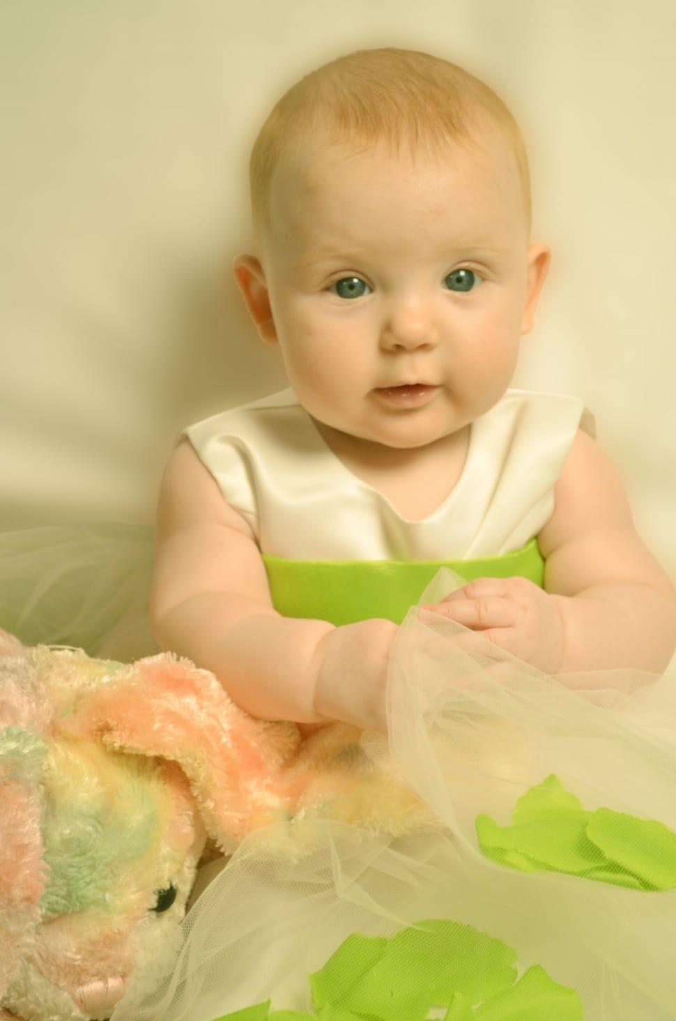 baby's white and green sleeveless dress preview