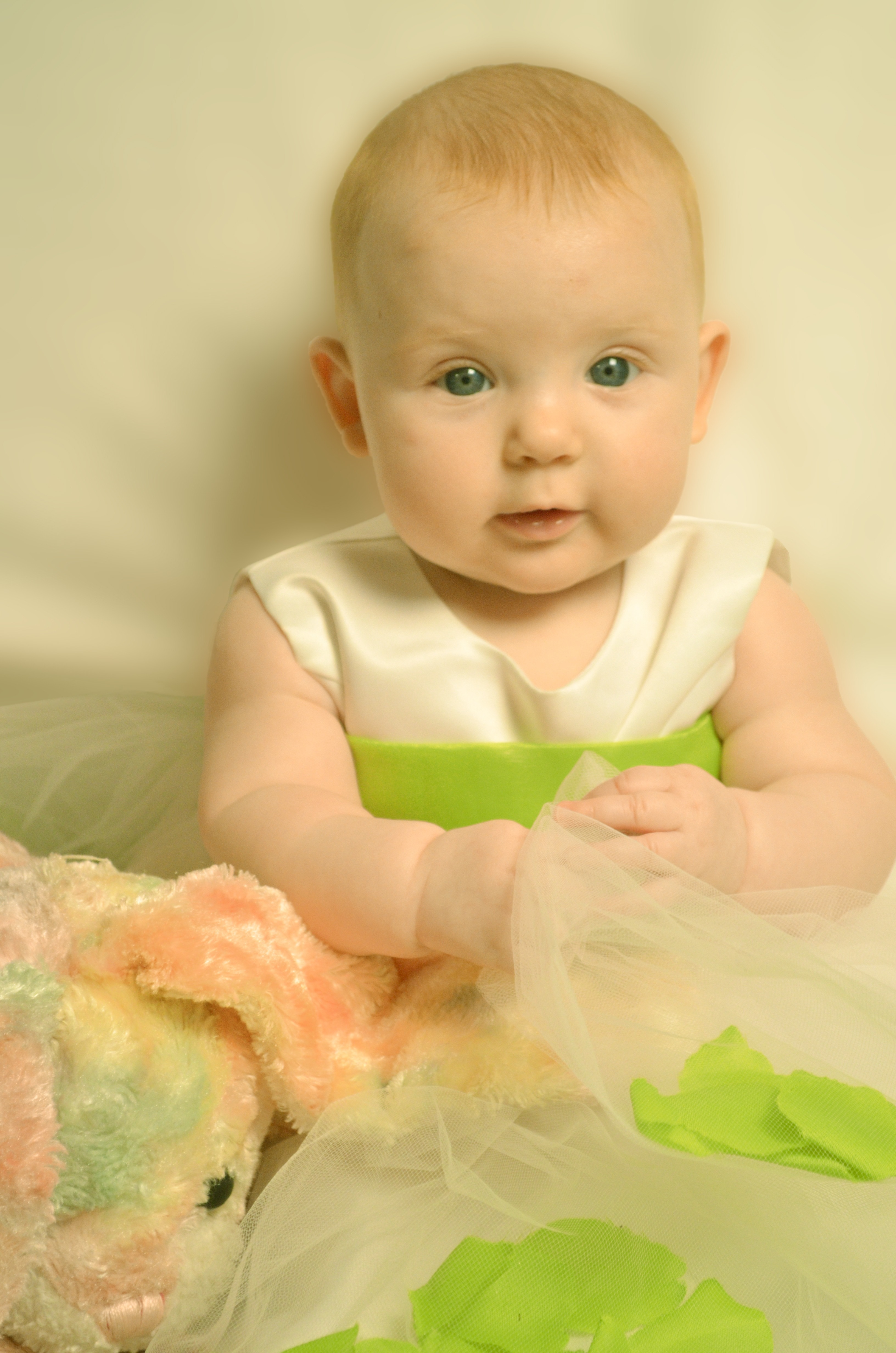 baby's white and green sleeveless dress