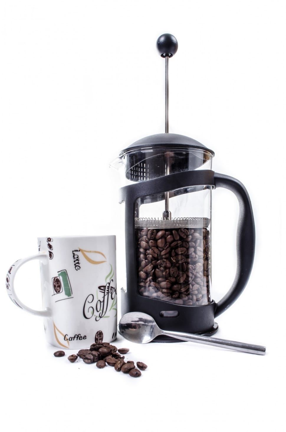 black press coffeemaker and white ceramic mug preview