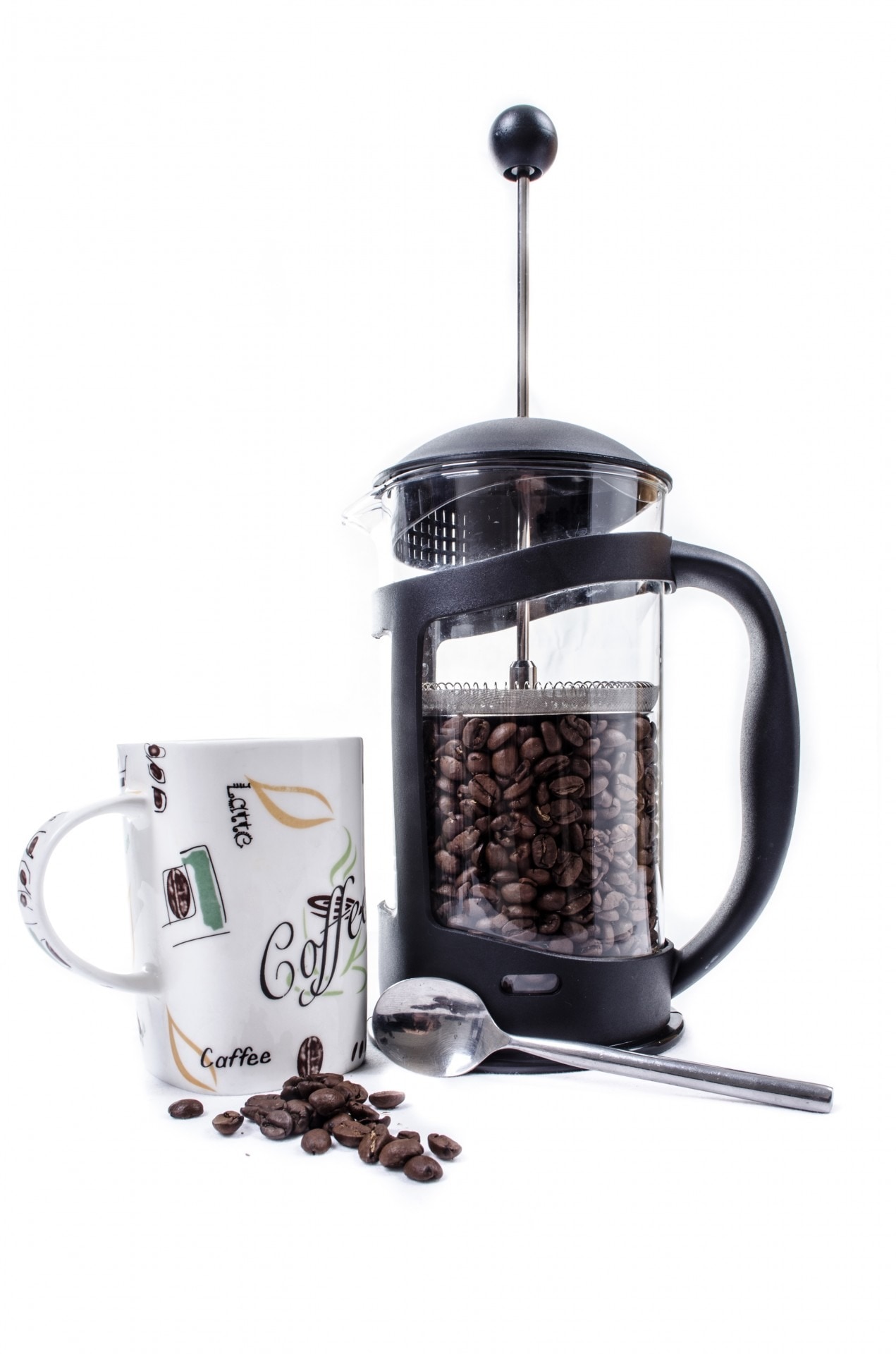 black press coffeemaker and white ceramic mug