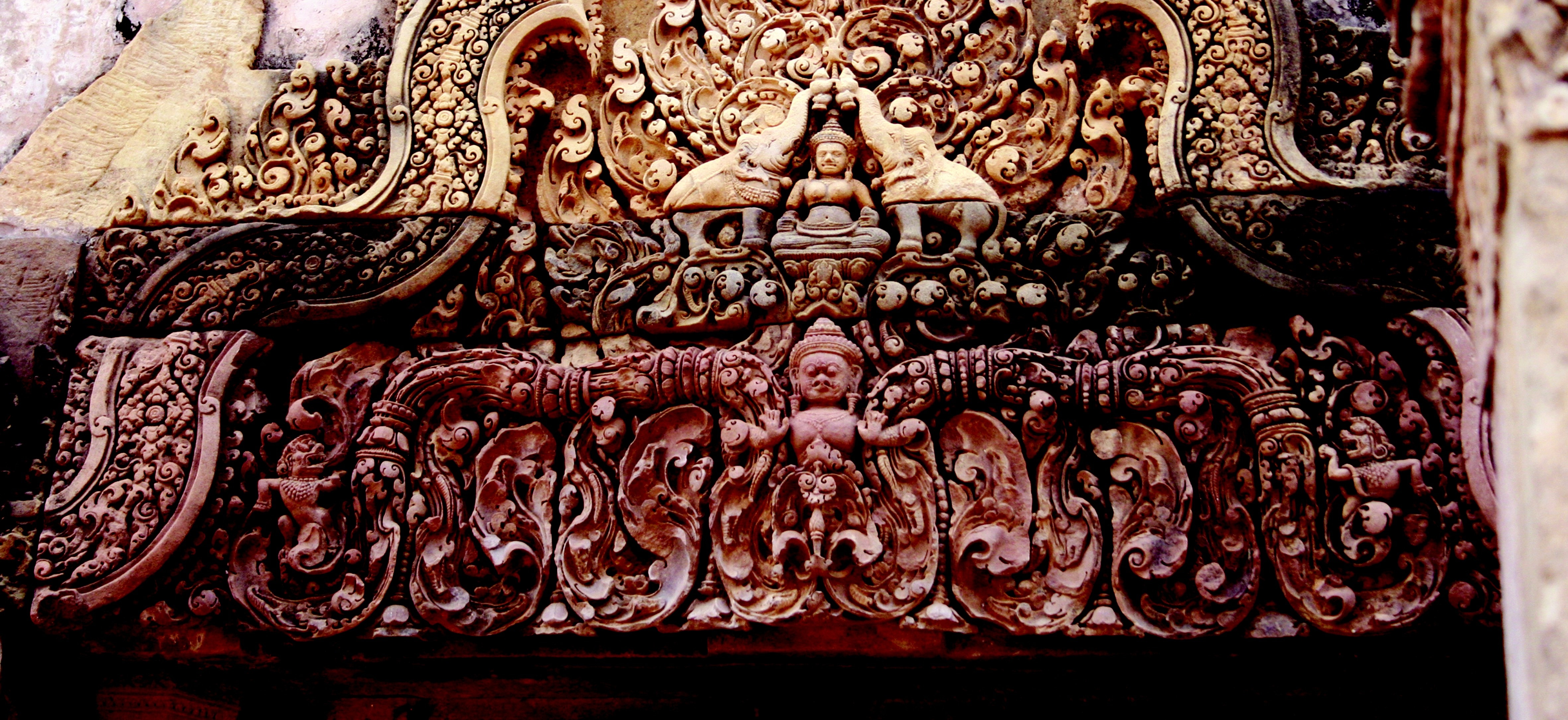 close up photo of hindu deity wooden decor