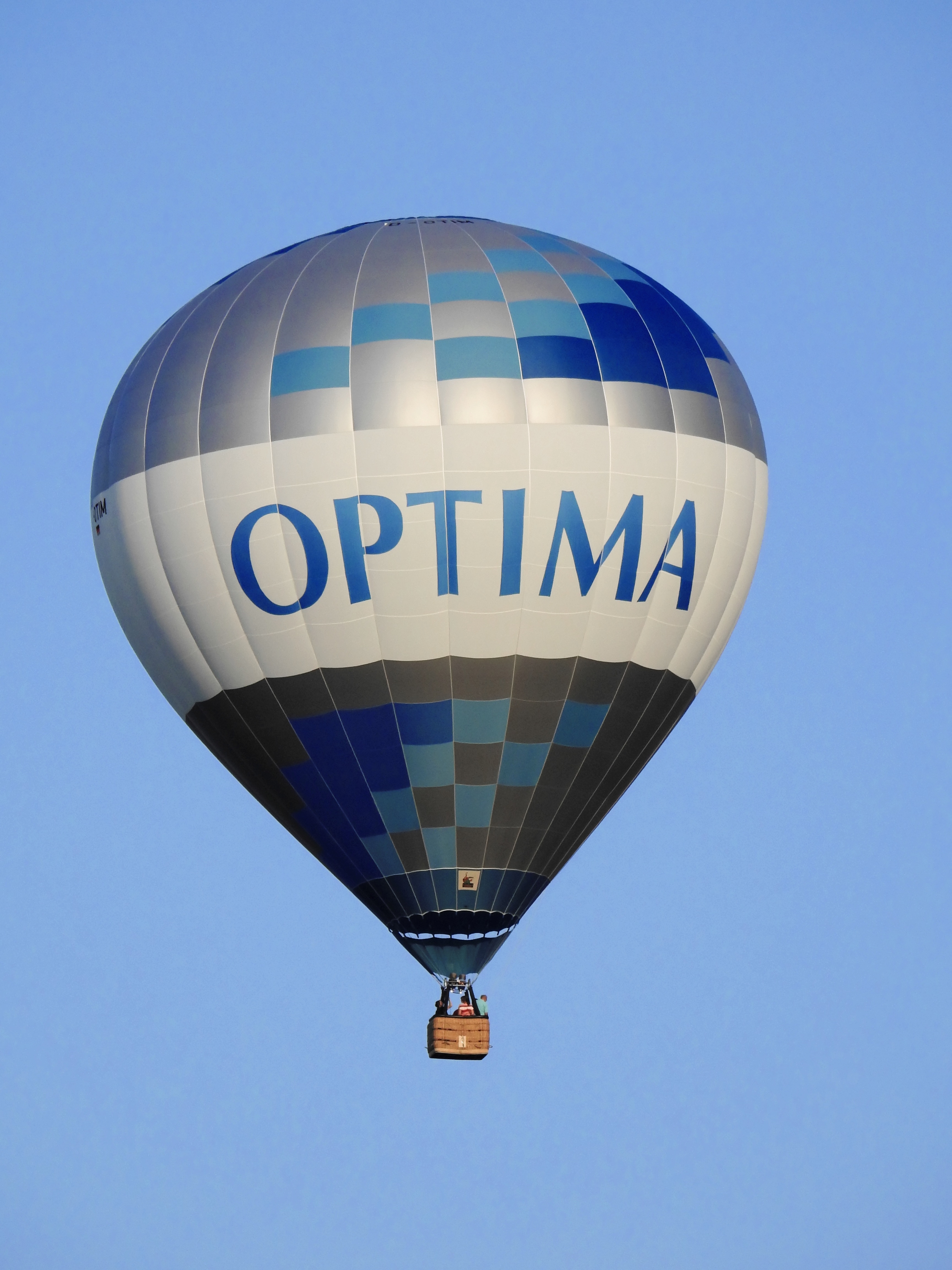 white blue and gray optima air balloon