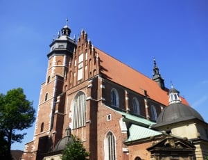 photo of beige and brown church structure thumbnail