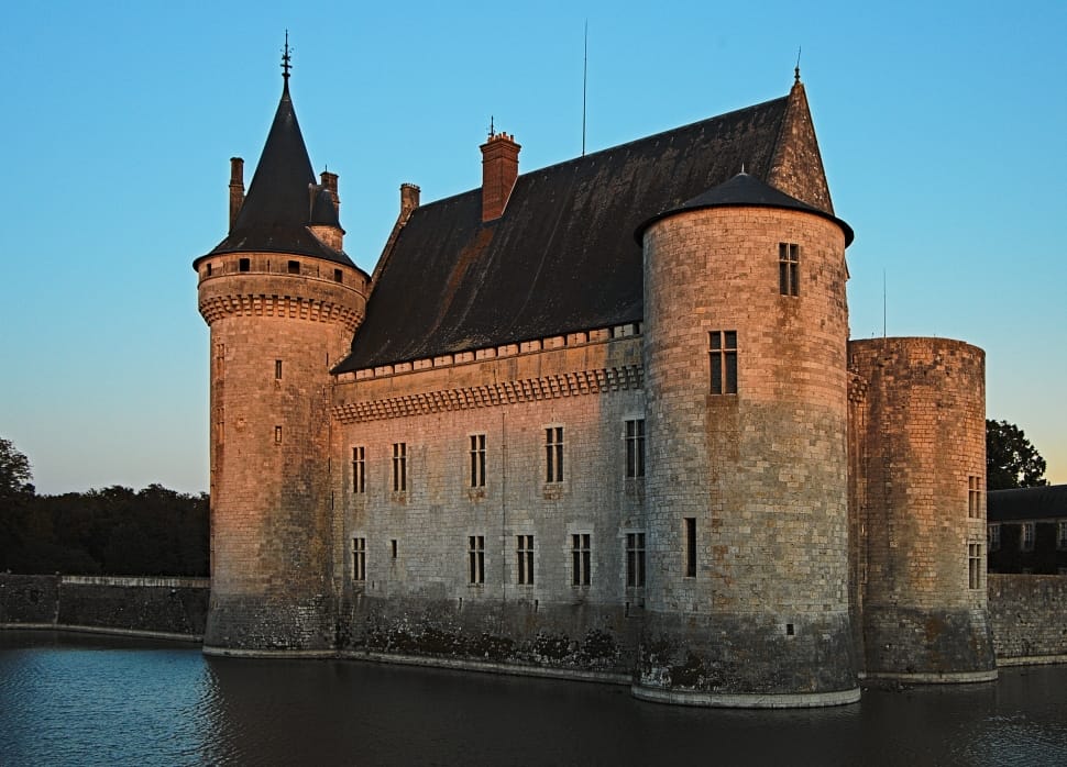 castle with river outer area under calm sky preview