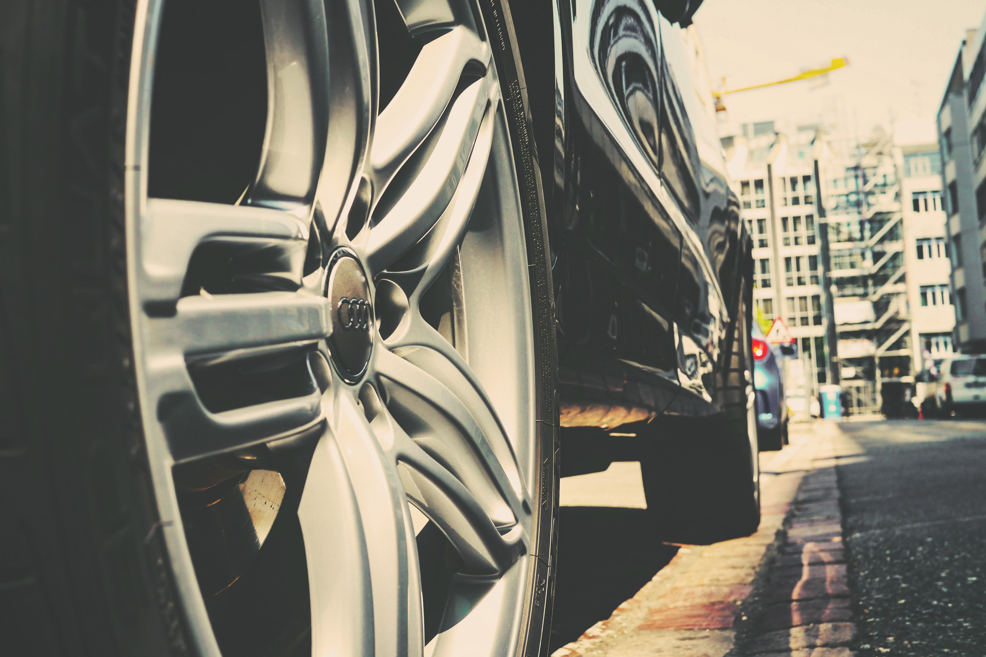 close up of silver car wheels