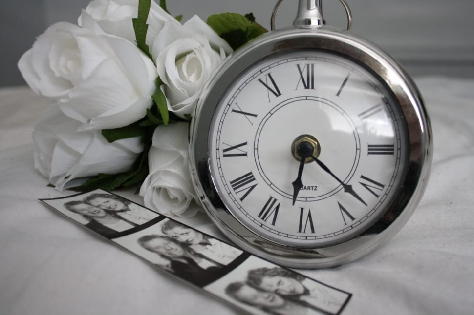 silver and white table analog clock preview