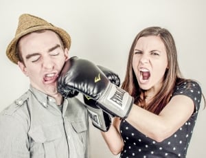 man and woman with boxing gloves thumbnail