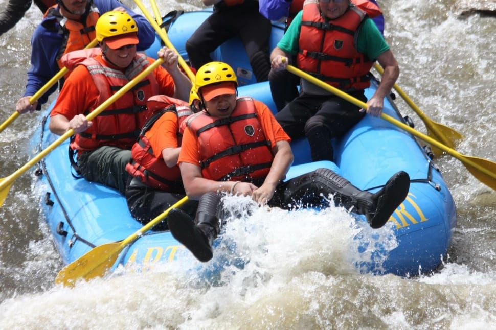 group of person riding on blue inflatable raft preview