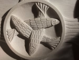 gray concrete fishes design carved decor thumbnail